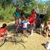 Explaining the project to a family of visitors to the island